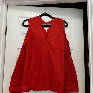 Red blouse , long sleeves